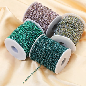 3.5mm colorful crystal bead chains with stainless steel links on silk background