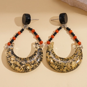 Vintage crescent earrings with red beads and gold foil resin drops in retro style