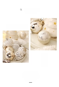 Detailed view of champagne gold and white Christmas ornaments with glitter and star patterns