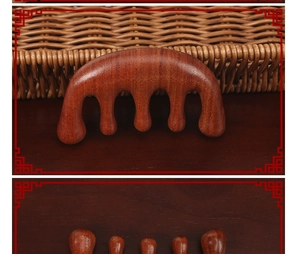 Close-up of natural red sandalwood wide-tooth massage comb with rich wood grain texture