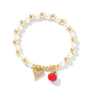 Golden beads and pearls bracelet with zircon heart and red apple charm pendants