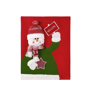 Festive red Christmas chair cover featuring a cute snowman applique and Welcome sign