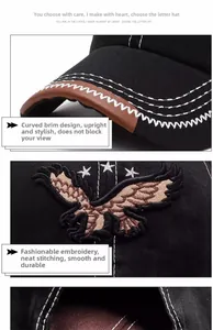 Detail of eagle embroidery and star patches on a black baseball cap with white stitching