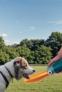 Detail of portable pet water bottle with wide yellow trough for large-mouth dogs