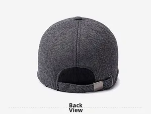 Detail view of winter baseball cap back with dark gray herringbone and metal buckle