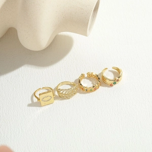 Luxurious 14K gold plated rings set with colorful zircons and geometric leaf designs