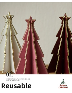Detailed view of three-dimensional mini wooden Christmas trees with gold glitter edges