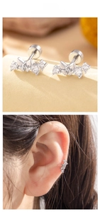 Macro view of butterfly zircon screw back stud earrings with 4 main stones in silver