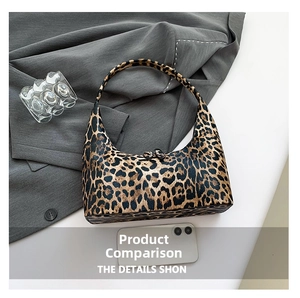 Leopard print bucket bag detail showing its large capacity compared to a smartphone