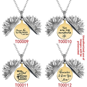 Detail of opening sunflower pendant engraved with You are my sunshine quote