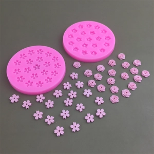 Pink silicone sakura and rose flower molds for cake decorating and chocolate baking