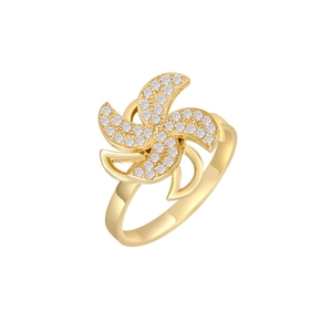 Rotating windmill gold ring with sparkling cubic zirconia on a minimalist open band