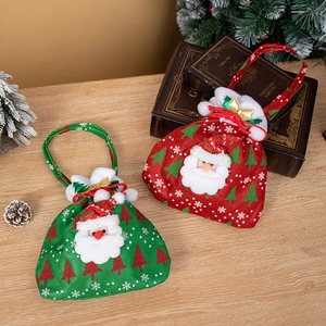 Red and green Christmas Santa gift bags with linen texture and plush embroidery