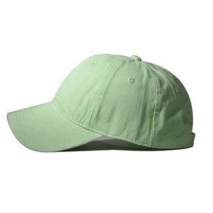 Detail view of the light green washed cotton baseball cap with breathable eyelets