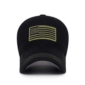 Classic black cotton tactical baseball cap with green American flag embroidery on white background