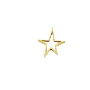 Close-up of golden hollow star metal charm for jewelry making on white background