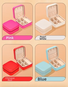 Mini portable jewelry organizer box with velvet lining in pink, white, red, and blue