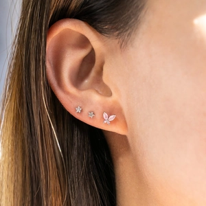 Three-piece stainless steel earring set with pink butterfly and silver flower studs