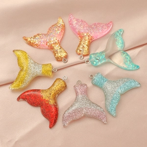 Colorful glitter gradient resin mermaid tail pendants in various sparkling shades