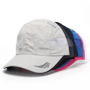 Close-up of quick-dry baseball caps showing breathable mesh panels and side logo