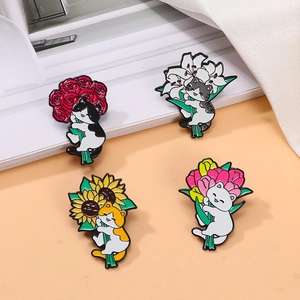 Set of four cartoon enamel cat pins holding roses, lilies, sunflowers and tulips