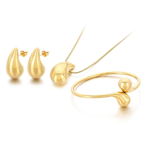 Golden teardrop jewelry set with necklace, earrings, and bracelet in high polish finish