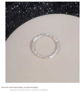 Detail of s925 silver multi-layer plated ring showing texture and shimmering finish