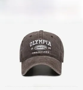 Detailed front view of washed cotton baseball cap with vintage 1980 athletic embroidery