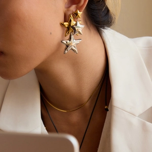 Minimalist 18K gold and silver two-tone stainless steel layered star drop earrings