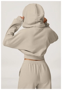 Back view of oatmeal hooded sweatshirt set with ribbed hem and matching joggers
