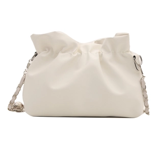 White pleated cloud bag with matte leather and woven silver chain strap on white background