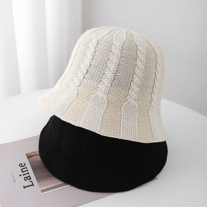 Detailed cable knit pattern on breathable hollow-out bucket hats in beige and black colors