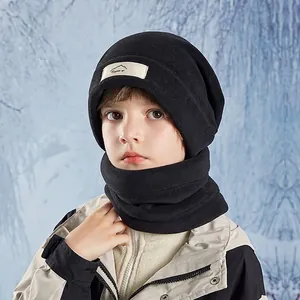 Kids winter polar fleece beanie and neck warmer set with mountain patch in black