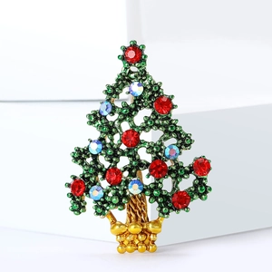 Christmas tree brooch with green enamel and multi-colored rhinestones on golden metal