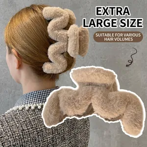 Large khaki plush shark hair claw clip for women featuring fuzzy wavy texture