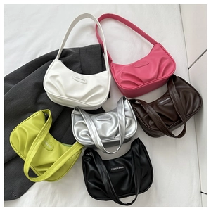 Detailed display of pleated shoulder bags in white pink brown lime silver and black colors