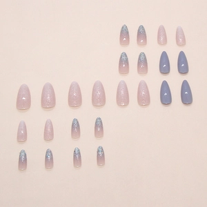 Clear blue and purple almond press-on nails with glitter gradient and solid matte finish