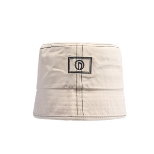 Fashionable beige cotton bucket hat with black embroidered logo on a white background