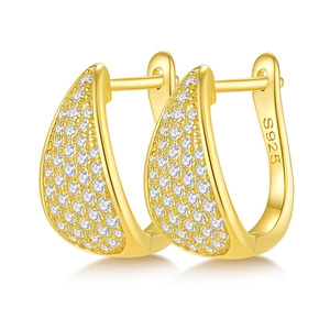 Close-up of golden S925 sterling silver U-shaped hoop earrings with white zircon stones