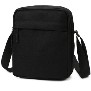 Vertical minimalist black canvas crossbody shoulder bag for men with front zipper pocket