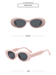 Detail view of pink oval sunglasses showing side temple joints with metal dot accents