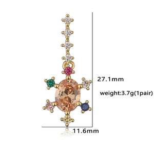 Golden sunburst earrings with colorful zircon stones measuring 27.1mm by 11.6mm