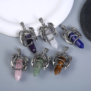 Set of six dragon-wrapped hexagonal crystal pendants in diverse colors on display