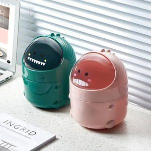 Cute dinosaur desktop trash cans in pink and green with transparent flip lids for office