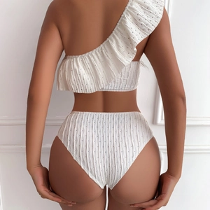 White ruffle one-shoulder bikini set with high-waisted bottoms and textured dots