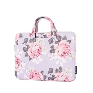 Lavender laptop sleeve with white rose patterns and zipper closure for 13-15 inch laptops