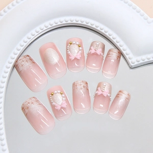 Cat eye press-on nails with pink gradient, 3D bows and pearls on mirror surface