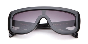 Detailed view of black aviator sunglasses with Hand Polish text and 55-22-145 size marks