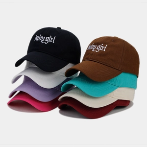 Collection of baseball caps featuring Babygirl gothic embroidery in eight colors