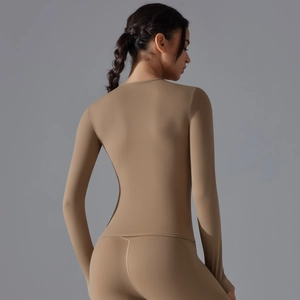 Slim fit khaki long sleeve yoga top and leggings set shown from a back view perspective